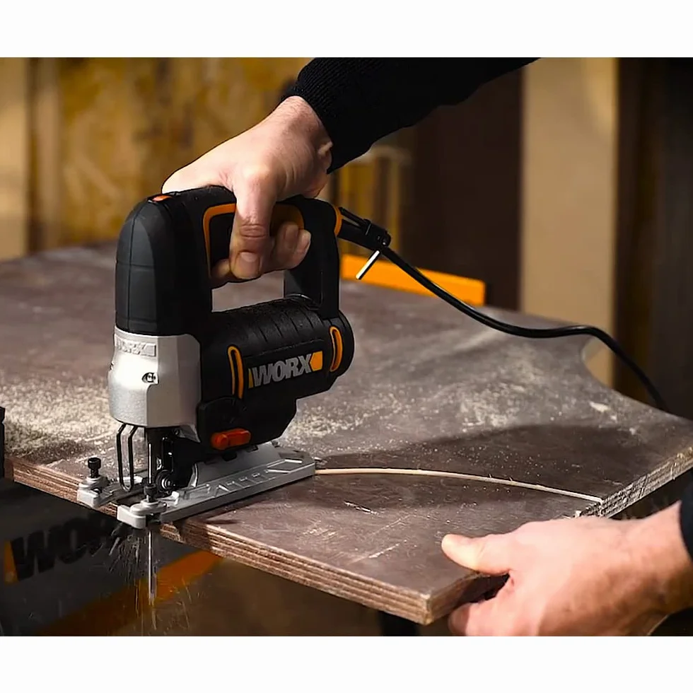 WORX WX478.1 Sierra de Calar 650W con Péndulo 4 Posiciones, Corte en Madera 90mm y Metal 8mm, Cambio Rápido Cuchilla, Soplador, Maletín Incluido